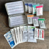 Photo of inside of backpack first aid kit for college students. Color coded instructions for use. All contents pictured.